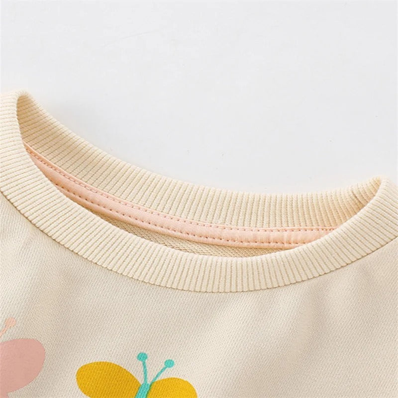 Girls Wearing Long Sleeved Hoodies Outside